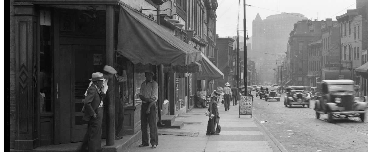 Black and white photo of busy street