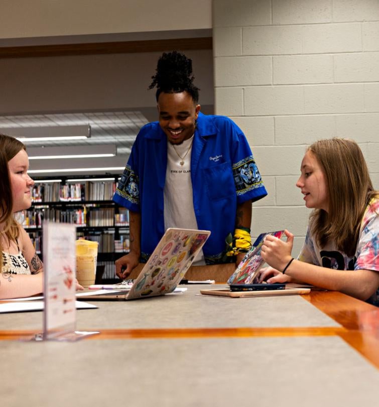 Greensburg students share a laugh while they study.
