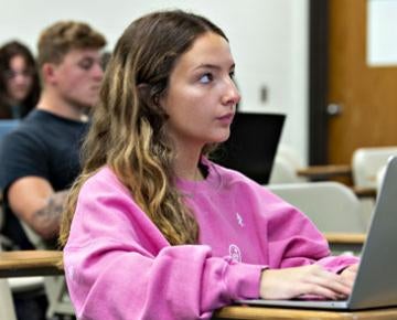 A student listens intently in class.