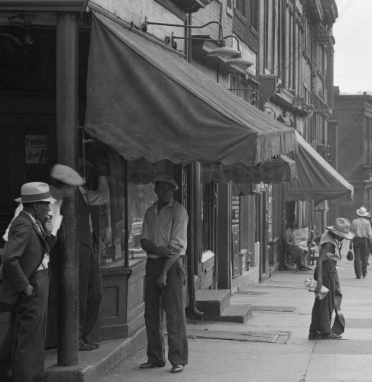 Black and white photo of busy street